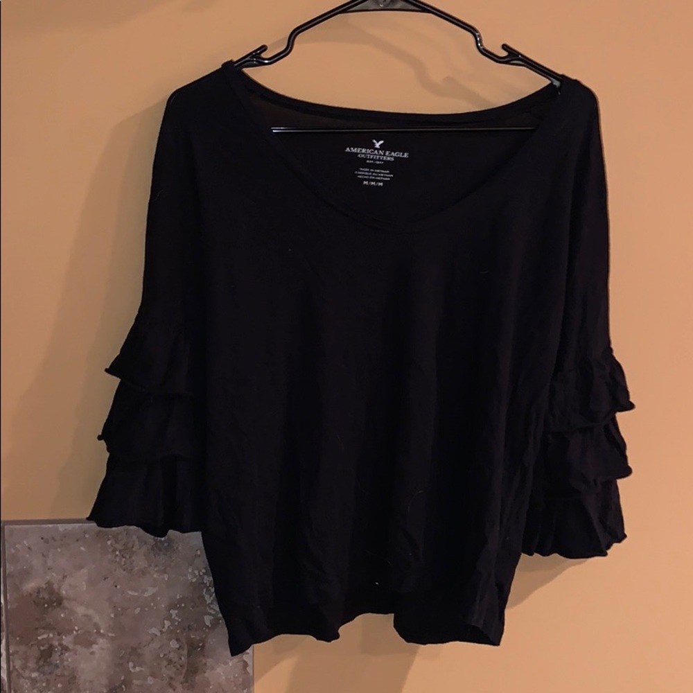 Black ruffle sleeve top